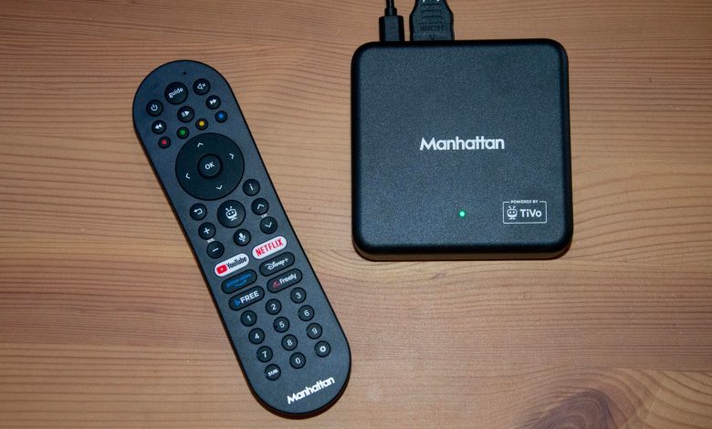 Top-down view of the Manhattan Aero 4K TV Streamer with Freely box and its remote control