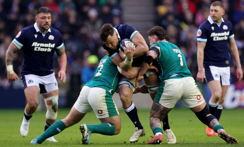 Jack Dempsey of Scotland is tackled by Andrew Porter and Ronan Kelleher of Ireland during Six Nations match between Scotland and Ireland.
