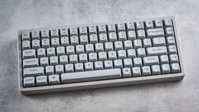 The Keychron K2 HE in concrete, on a stone surface.