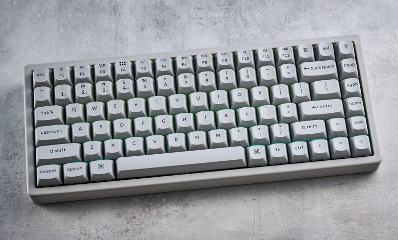 The Keychron K2 HE in concrete, on a stone surface.