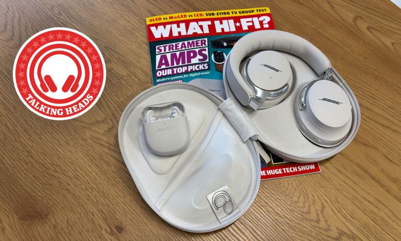 Bose QC Ultra earbuds and headphones in their cases on a copy of What Hi-Fi? magazine on a table