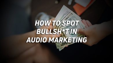 A photo of two people exchanging money with the article's title overlaid.