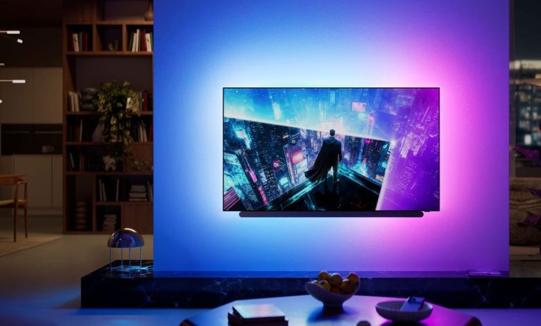 Philips OLED911 wall mounted in a modern living room