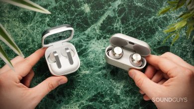 hands holding the samsung galaxy buds 4 pro vs technics az1000