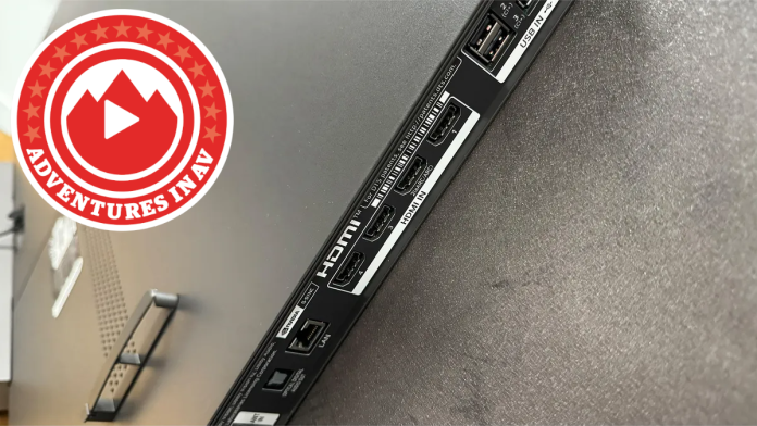 The rear of a TV showing four HDMI sockets and a logo reading "Adventures in AV"