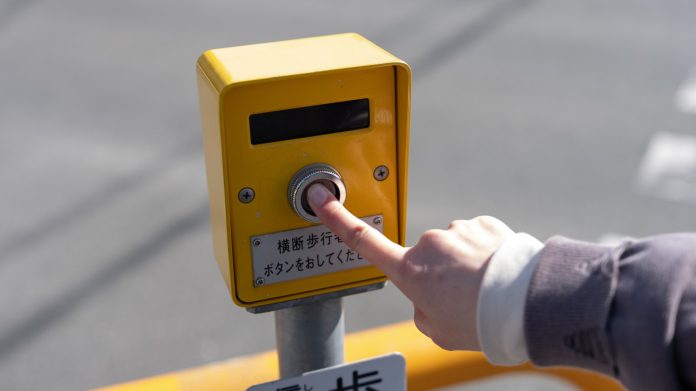 Do Crosswalk Buttons at Traffic Lights Really Work?

