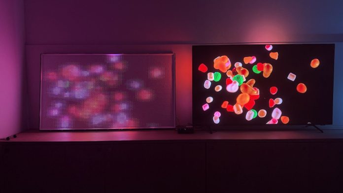 The Philips MLED981 RGB Mini LED TV running alongside a version with the backlight exposed.
