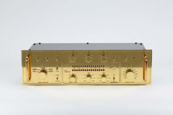 gold Burmester 777 on white background