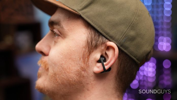 Side profile of a person wearing the EarFun Clip 2 earbuds, highlighting the open-ear clip-on design and secure fit.