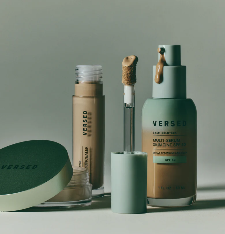 Applying Versed skincare products to my face