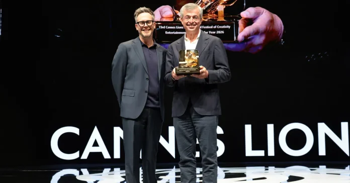 Eddy Cue accepts the Entertainer of the Year Award at the Cannes Lions

