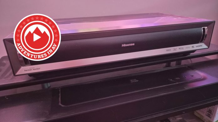 Hisense PX3 on stand with Adventures in AV logo