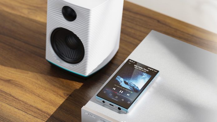 Fiio JM21 in sunlight on top of an audio receiver