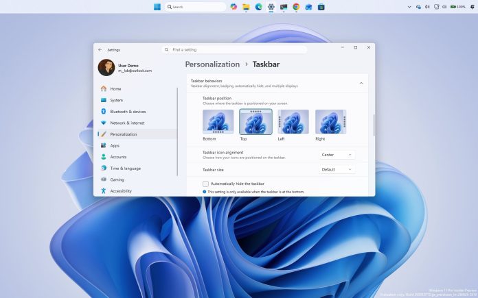 Windows 11 desktop with the Settings app opened and the Taskbar located at the top of the screen.